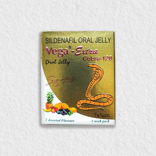 A gold-colored packaging box for Vega-Extra Cobra-120 Oral Jelly, featuring the text "SILDENAFIL ORAL JELLY" at the top. The brand name "Vega-Extra Cobra-120 Oral Jelly" is prominently displayed in pink and black lettering, with a signature mark below it. The box showcases an image of a coiled cobra and a variety of fruits including pineapple, orange, banana, and berries, indicating 7 assorted flavors. The label also mentions "7x5gm" and "1 week pack" at the bottom